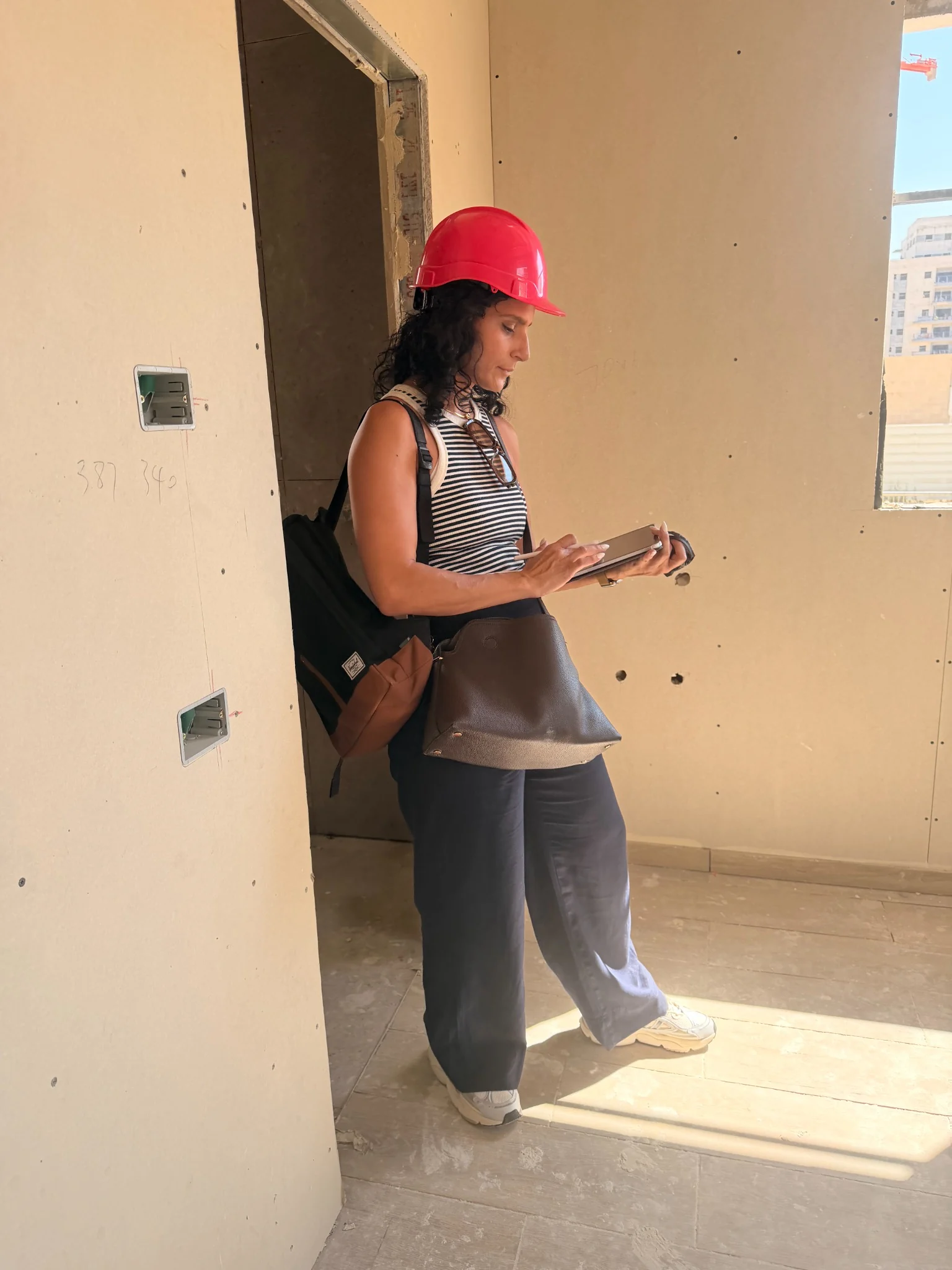 Maayan Amoyal supervising construction on site
